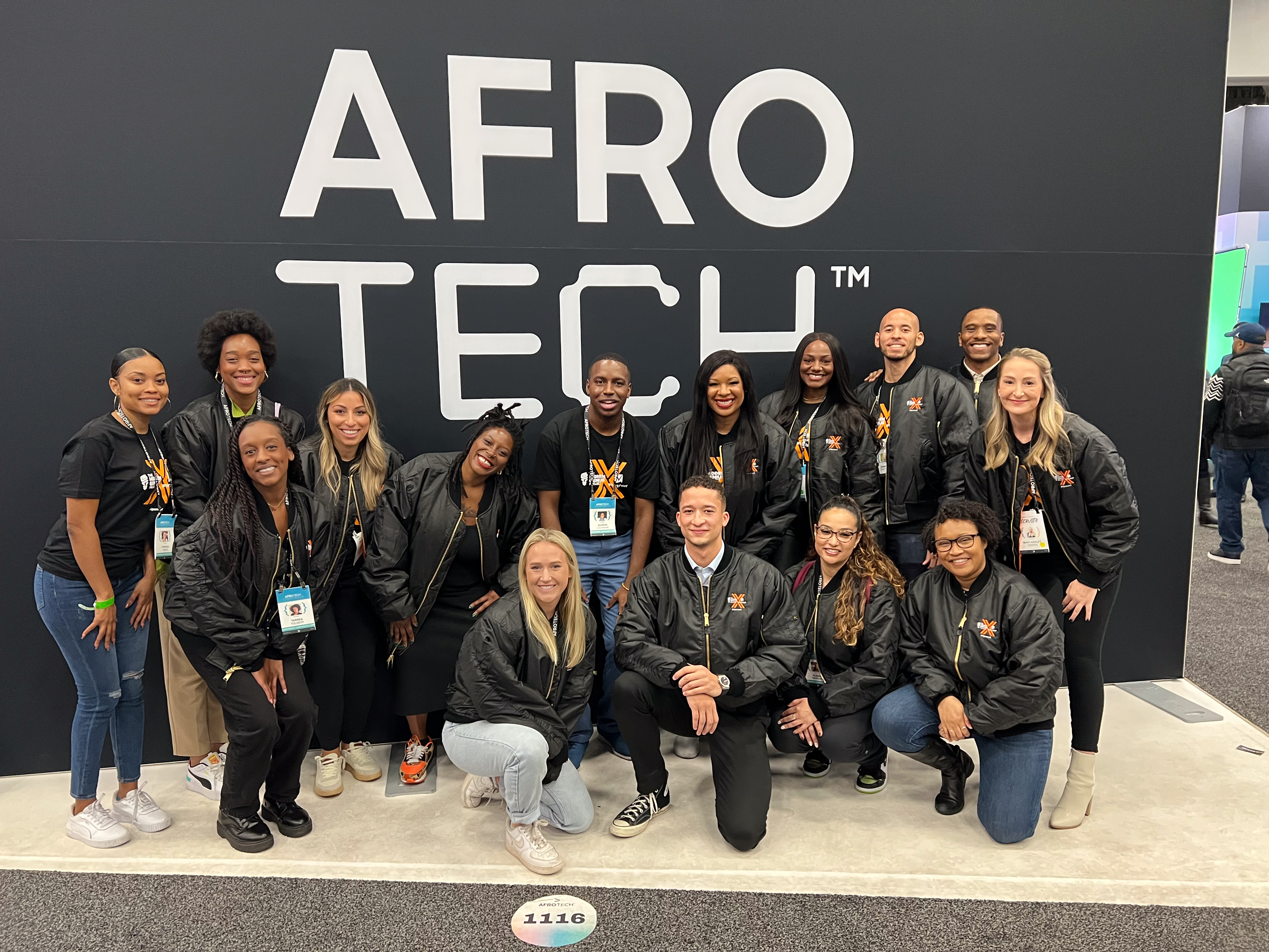 Group of people smiling at Afro Tech conference